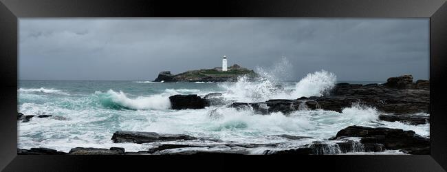 Godrevy Lighthouse Storm Waves Cornwal South west coast path Framed Print by Sonny Ryse