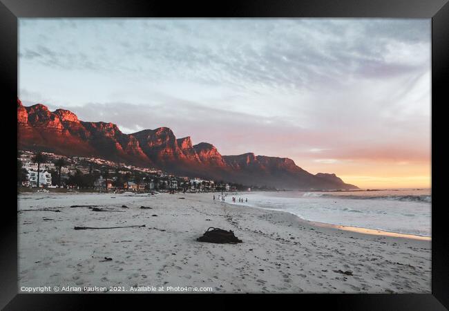 Late afternoon sunset over Camps Bay beach  Framed Print by Adrian Paulsen