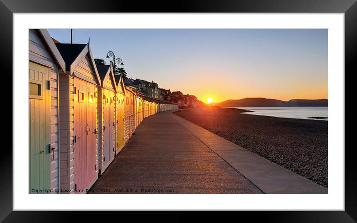 Beach huts at sunrise in Lyme Regis Framed Mounted Print by Love Lyme Regis
