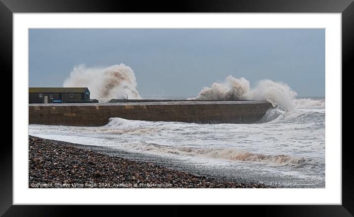 Huge waves crashing against the Cobb Storm Ciaran Lyme Regis Framed Mounted Print by Love Lyme Regis