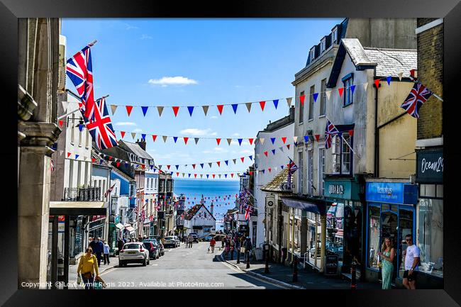 Broad Street Lyme Regis with bunting and union jack flags Framed Print by Love Lyme Regis