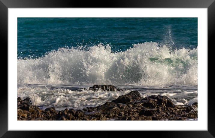 Surf on the rocks Framed Mounted Print by Margaret Ryan