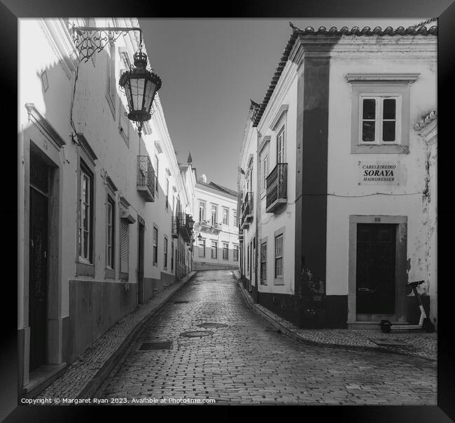 Serene Backstreets of Faro Framed Print by Margaret Ryan