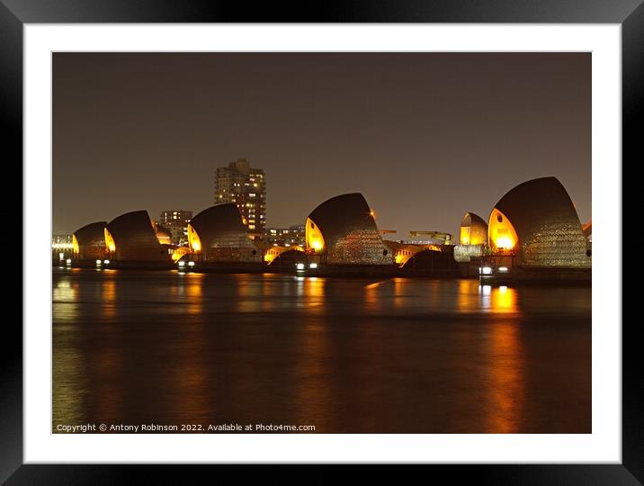 Thames Barrier lit up at night Framed Mounted Print by Antony Robinson