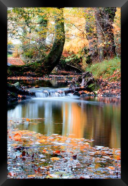 Autumn Scene on The River Framed Print by Les Schofield