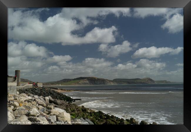 Looking towards Charmouth From Lyme Regis  Framed Print by Les Schofield