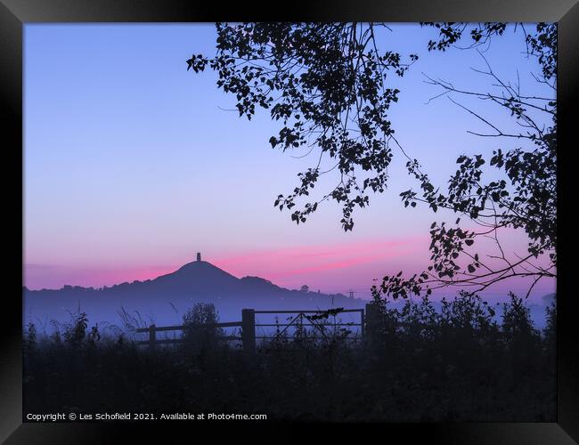 Majestic Glastonbury Tor at Sunrise Framed Print by Les Schofield