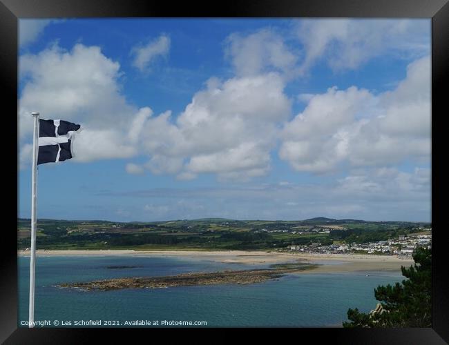 Cornish Flag Over St Micheals Mount  Framed Print by Les Schofield