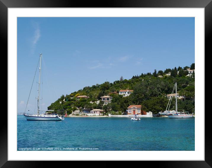 Boats in harbour at Paxos Greece  Framed Mounted Print by Les Schofield