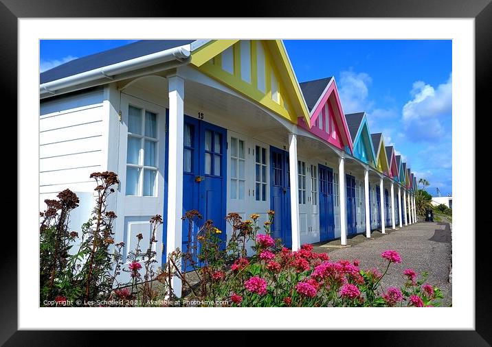 Beach huts  in weymouth  Framed Mounted Print by Les Schofield