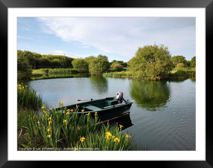 Lake and boat  Framed Mounted Print by Les Schofield
