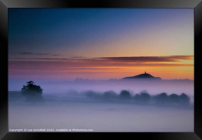 Majestic Sunrise Over Glastonbury Tor Framed Print by Les Schofield