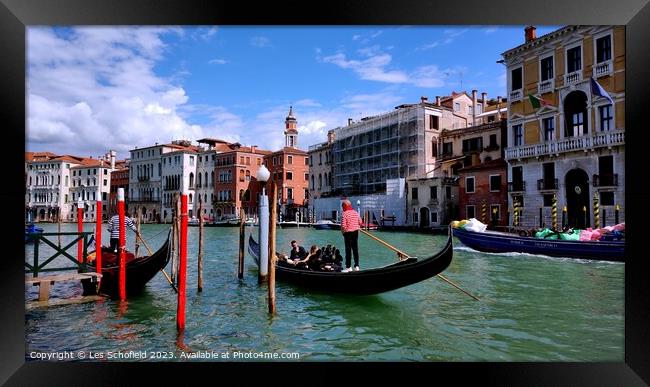 Serene and Romantic Venetian Gondola Ride Framed Print by Les Schofield