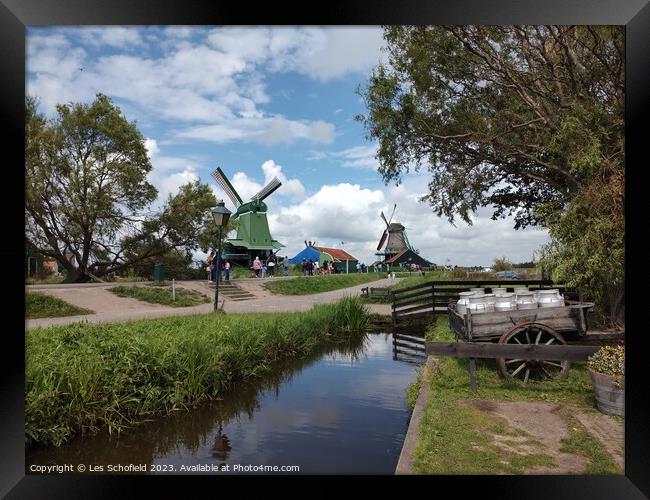 Dutch windmills in Netherlands  Framed Print by Les Schofield