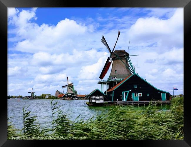 Windmill in zaanse Holland  Framed Print by Les Schofield