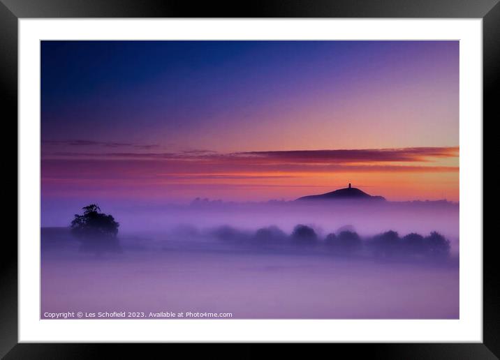 Glastonbury Tor in morning mist Framed Mounted Print by Les Schofield