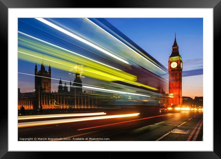 Light trails left by double decker bus passing by Big Ben in London UK Framed Mounted Print by Marcin Rogozinski