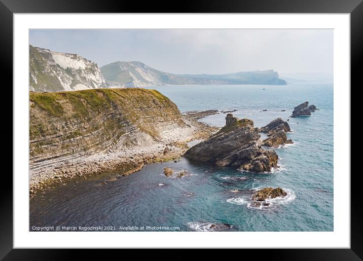Sea stacks at Mupe Bay near Lulworth in Dorset England United Kingdom UK Framed Mounted Print by Marcin Rogozinski