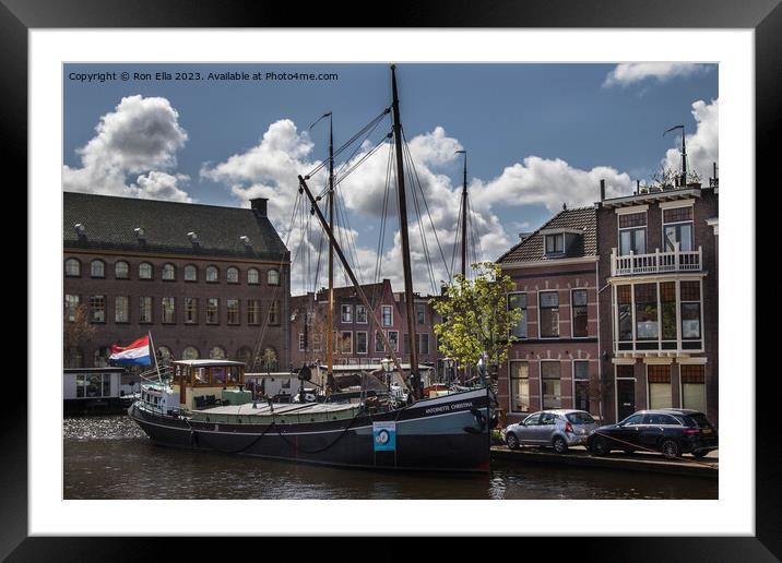 Navigating Leiden's Historic Harbor Framed Mounted Print by Ron Ella