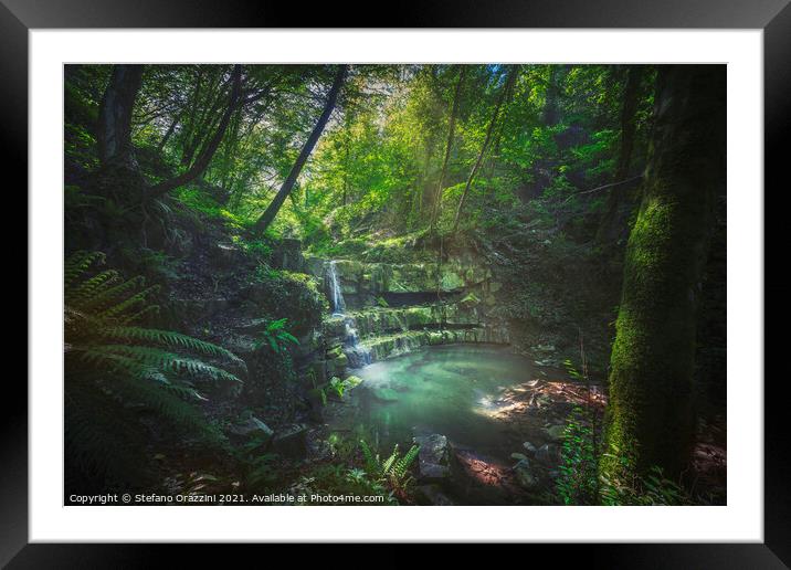 Waterfall inside a forest. Tuscany Framed Mounted Print by Stefano Orazzini