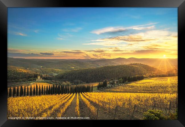 Chianti vineyards at sunset. Tuscany Framed Print by Stefano Orazzini