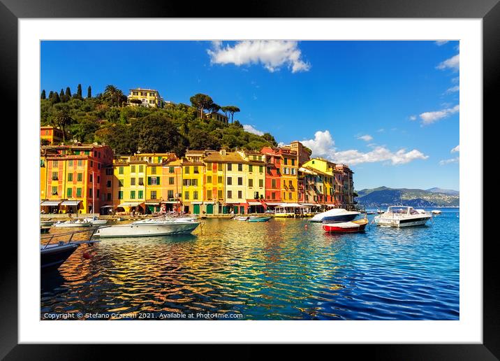 Portofino village and boats in marina Framed Mounted Print by Stefano Orazzini