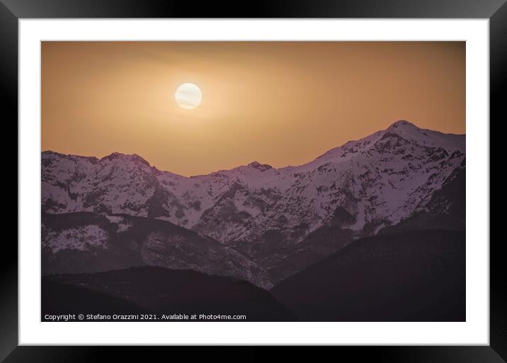 Alpi Apuane mountains orange sunset. Framed Mounted Print by Stefano Orazzini
