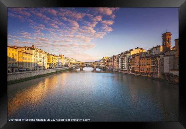 Ponte Vecchio bridge and Arno river in Florence at sunset. Framed Print by Stefano Orazzini