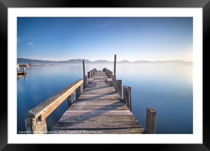 Wooden jetty and lake at sunrise. Torre del Lago Puccini Framed Mounted Print by Stefano Orazzini