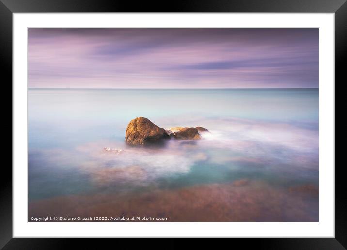 Rock and sea, long exposure photography. Framed Mounted Print by Stefano Orazzini