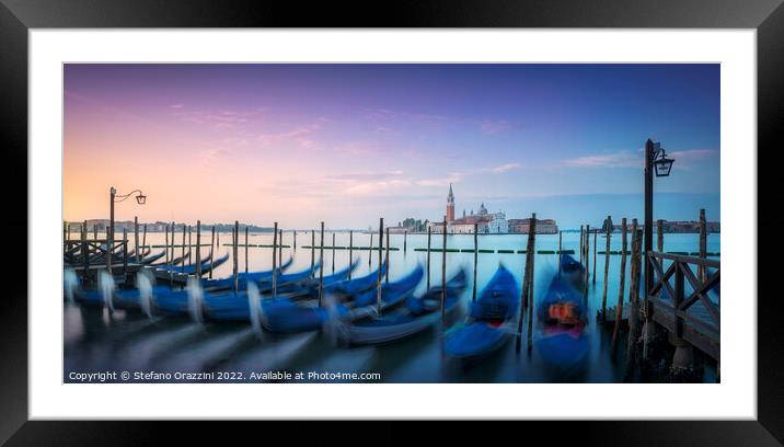 Venice lagoon, San Giorgio church and gondolas at sunrise. Italy Framed Mounted Print by Stefano Orazzini
