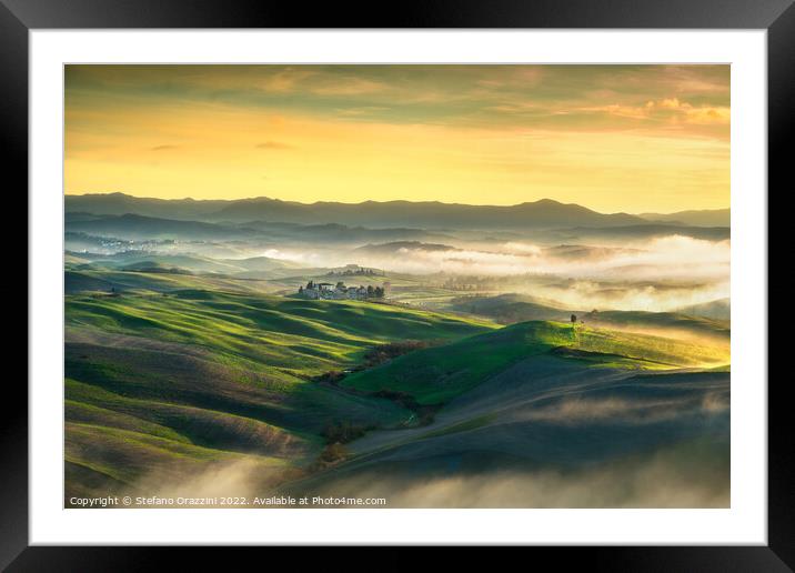 Volterra foggy landscape, rolling hills at sunset. Tuscany Framed Mounted Print by Stefano Orazzini