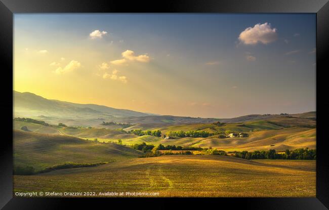 Landscape in Tuscany, rolling hills at sunset Framed Print by Stefano Orazzini
