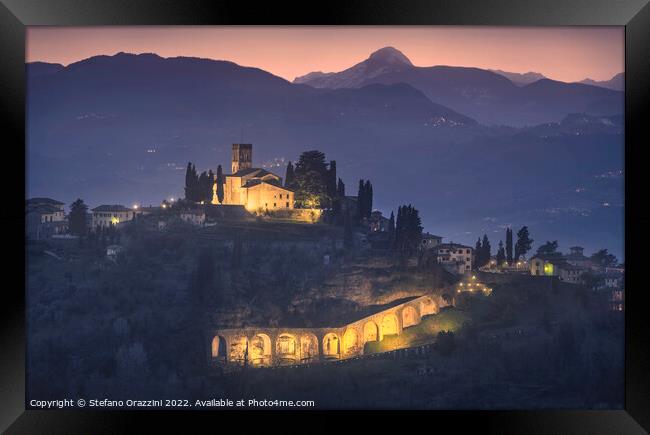 Barga town and Alpi Apuane mountains in winter. Tuscany Framed Print by Stefano Orazzini