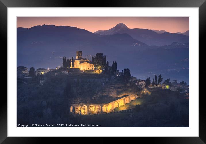 Barga town and Alpi Apuane mountains in winter. Tuscany Framed Mounted Print by Stefano Orazzini