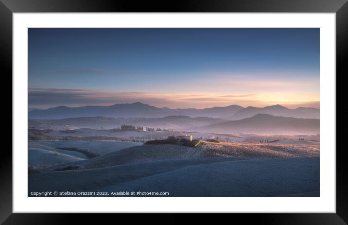 Volterra, winter panorama, blue sunset. Framed Mounted Print by Stefano Orazzini