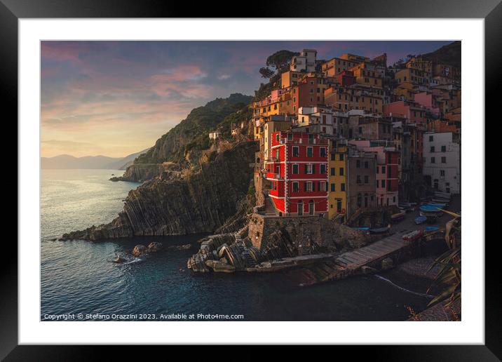 Riomaggiore village view at sunset. Cinque Terre, Italy Framed Mounted Print by Stefano Orazzini