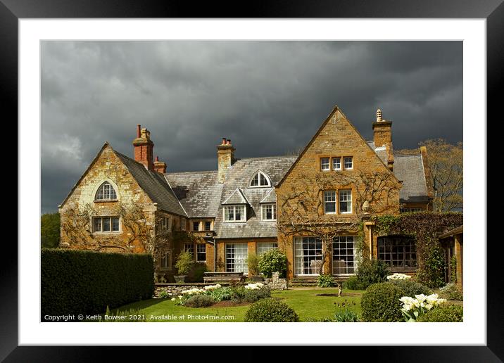 Coton Manor with approaching storm Framed Mounted Print by Keith Bowser