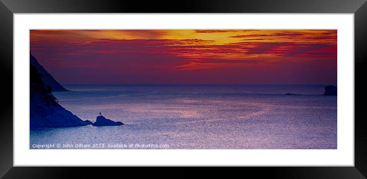 Watching the Sunset from a rock in Saint Lucia Framed Mounted Print by John Gilham