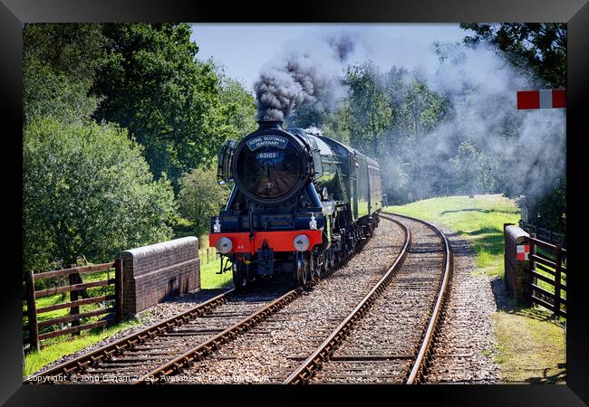 The Flying Scotsman 60103 Steam Locomotive under steam on its approach to Kingscote station West Sussex on a visit to The Bluebell Railway  Framed Print by John Gilham