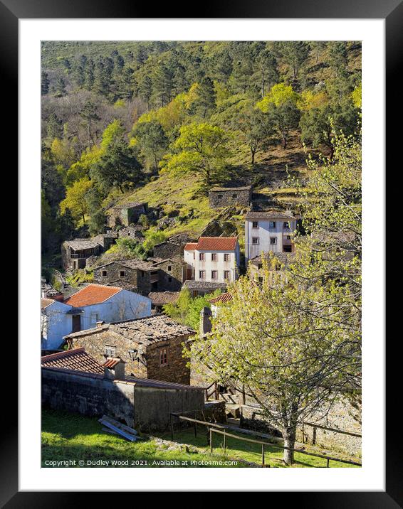 Stone and slate houses on steep wooded slope Framed Mounted Print by Dudley Wood