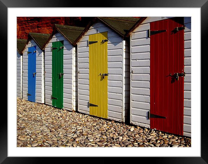 Wooden beach huts Framed Mounted Print by nick pautrat