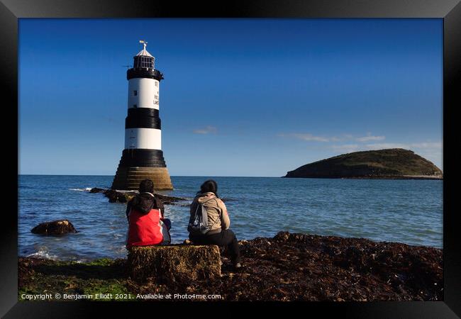 Lighthouse watching Framed Print by Benjamin Elliott