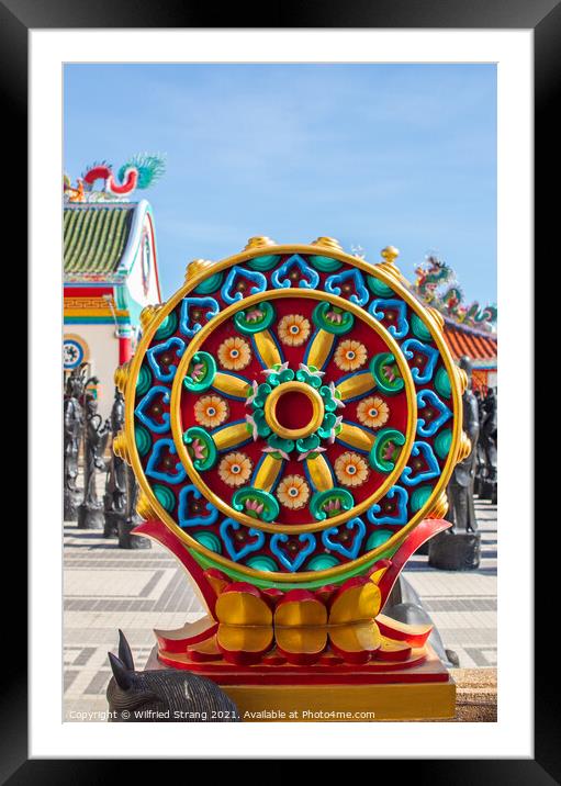 the Buddhist Dharma wheel known as that Wheel of teaching Framed Mounted Print by Wilfried Strang