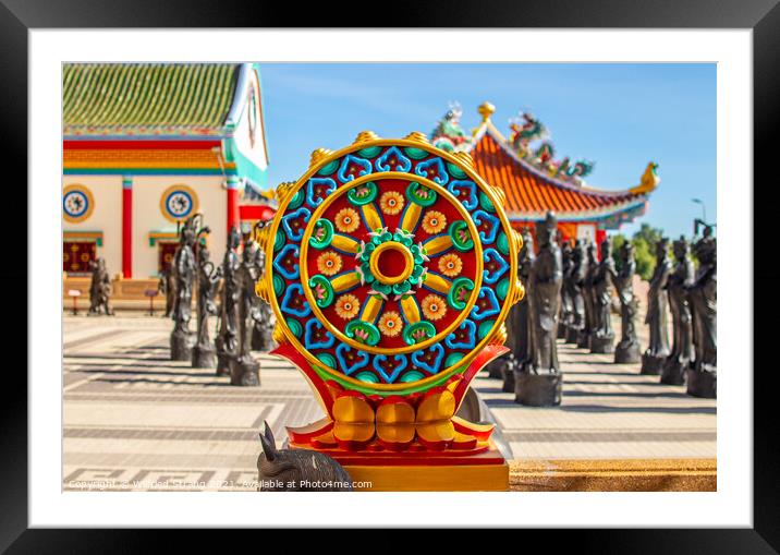 the Buddhist Dharma wheel known as that Wheel of teaching Framed Mounted Print by Wilfried Strang