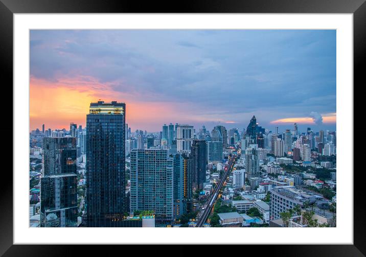 The Cityscape, the Railway of the Skytrain and the skyscraper of Bangkok in Thailand Southeast Asia at the Evening Framed Mounted Print by Wilfried Strang