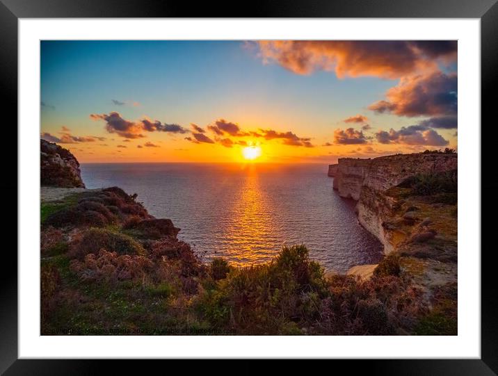 Picturesque Sunset with surrounding cliffs of the  Framed Mounted Print by Maggie Bajada