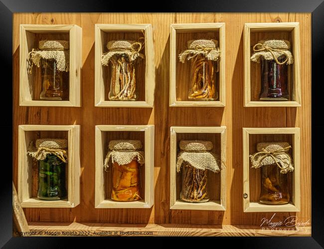 Display of Pickled Jars on a wooden shelves. Framed Print by Maggie Bajada