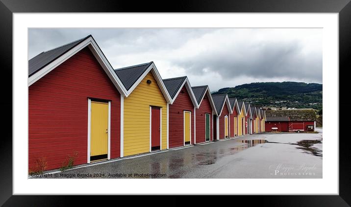 Boat houses in Red and Yellow with Mountains background in Norway Framed Mounted Print by Maggie Bajada