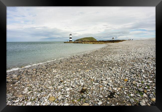 Stony Beach at Penmon Point, Anglesey Framed Print by Ian Miller